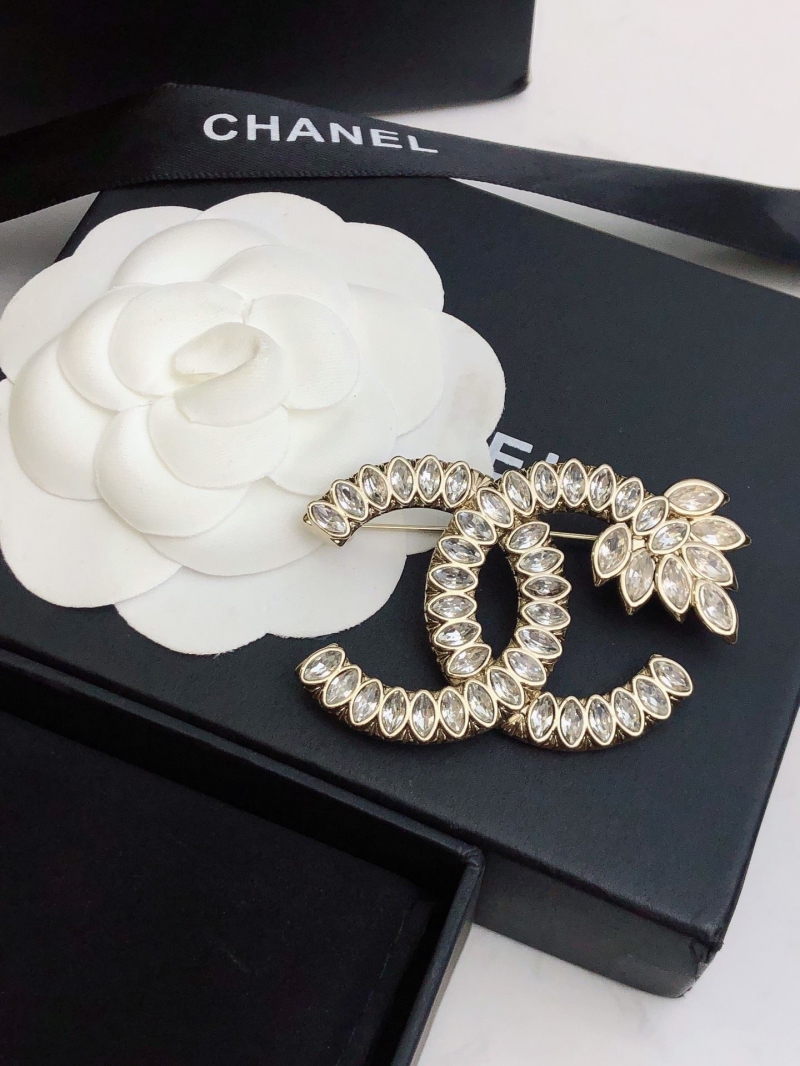 Ch**el brooches